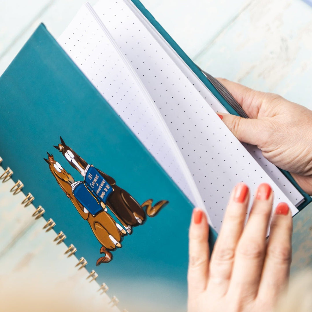 Emily Cole '101 expensive and inconvenient things to do’ A4 Dotted Hardback Notebook - The Glamorous Grub