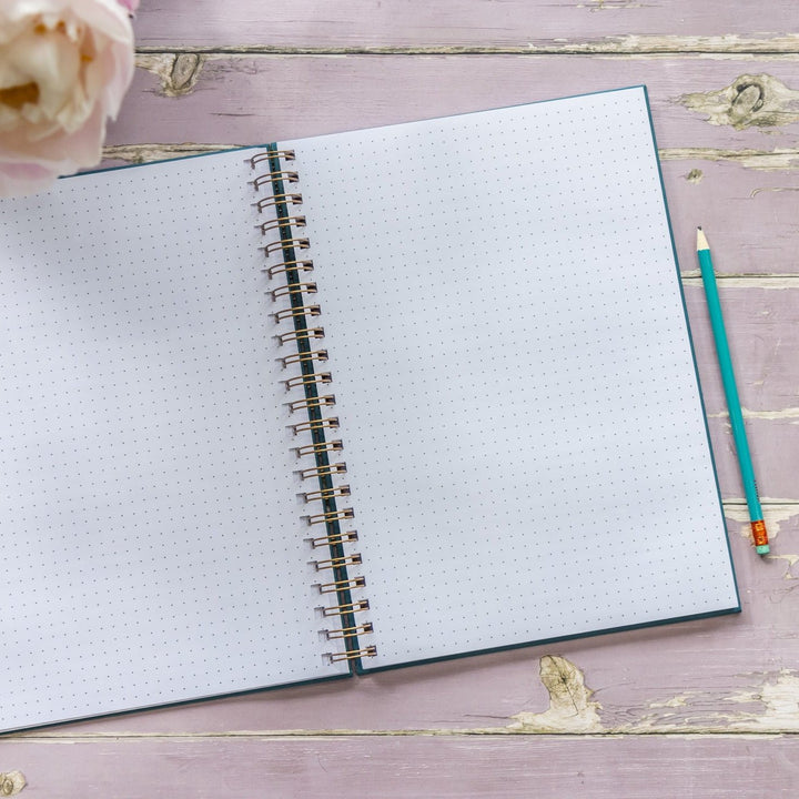 Emily Cole '101 expensive and inconvenient things to do’ A4 Dotted Hardback Notebook - The Glamorous Grub