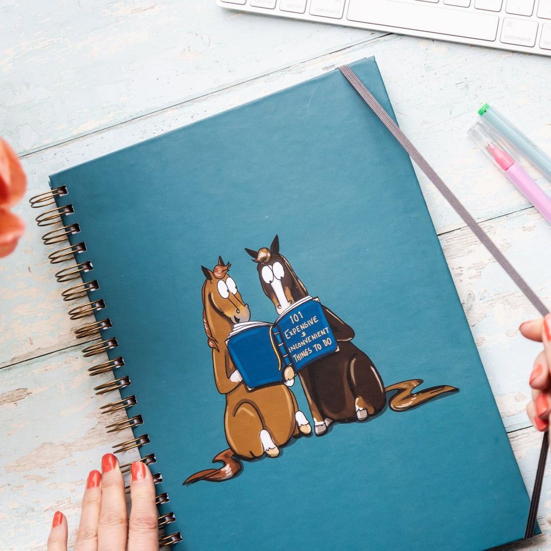 Emily Cole '101 expensive and inconvenient things to do’ A4 Dotted Hardback Notebook - The Glamorous Grub